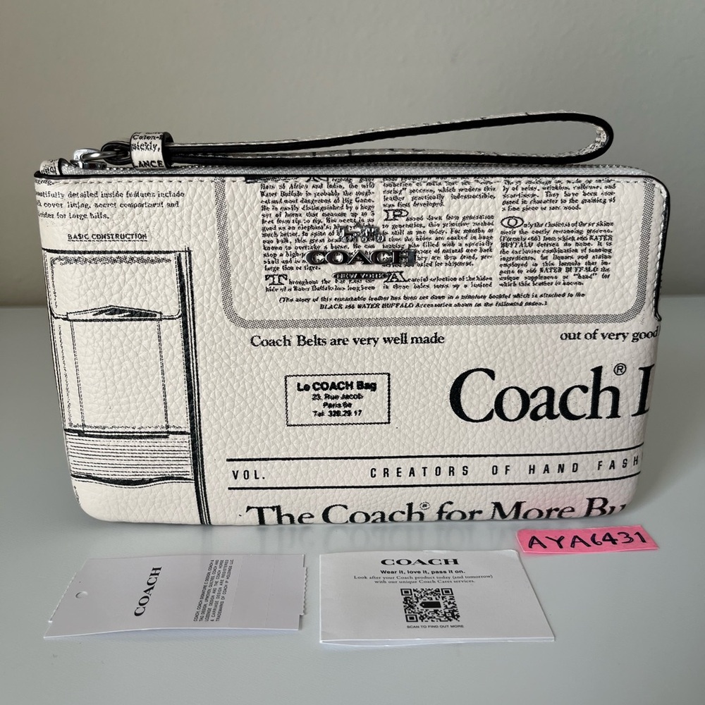 Coach Large Corner Zip Wristlet With Newspaper Print🎈🎈